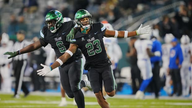 Nov 17, 2022; New Orleans, Louisiana, USA; Tulane Green Wave safety Lummie Young IV (23) celebrates an interception against the Southern Methodist Mustangs during the second half at Yulman Stadium. Mandatory Credit: Andrew Wevers-USA TODAY Sports
